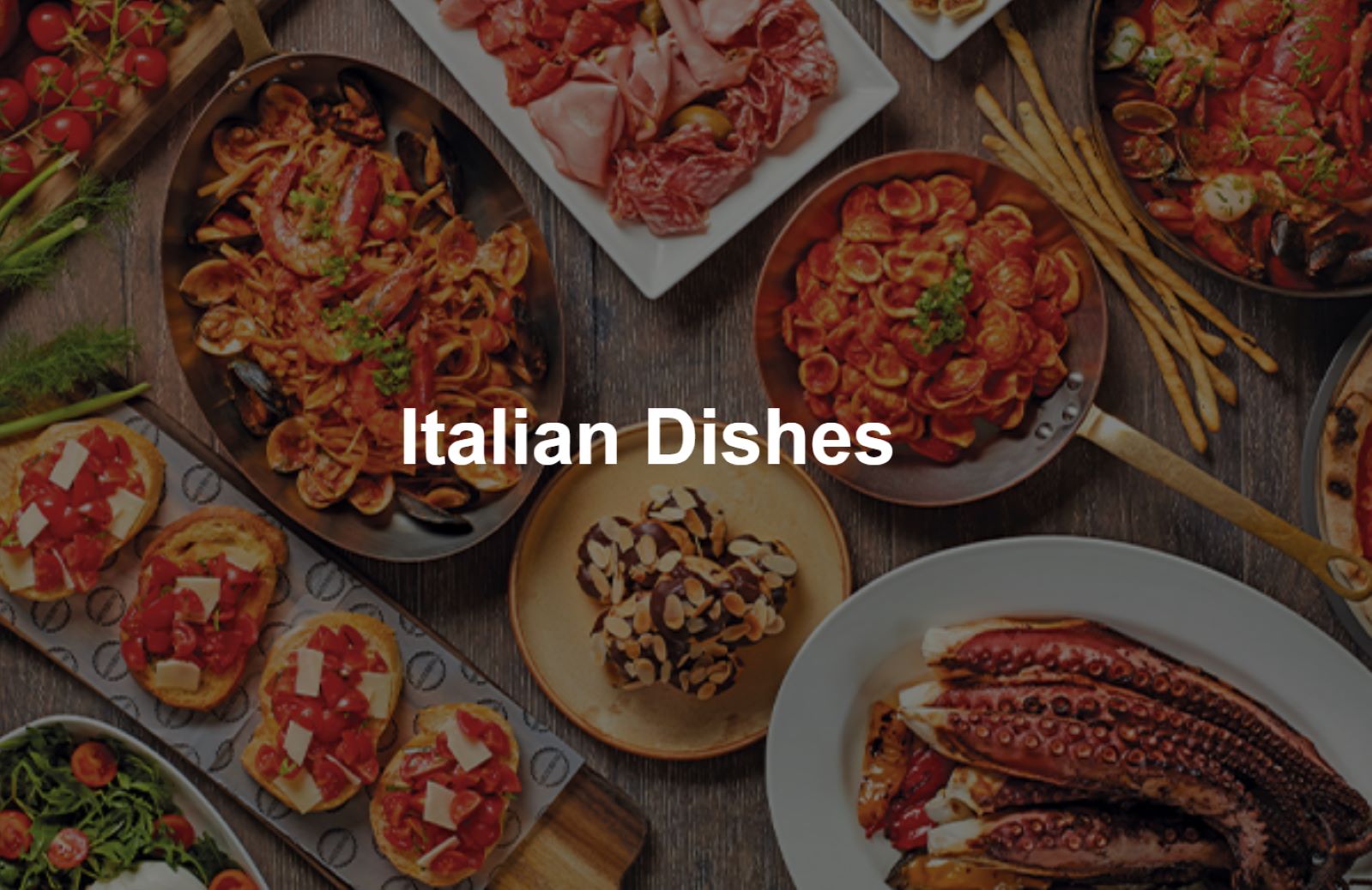 A table with various Italian dishes laid out