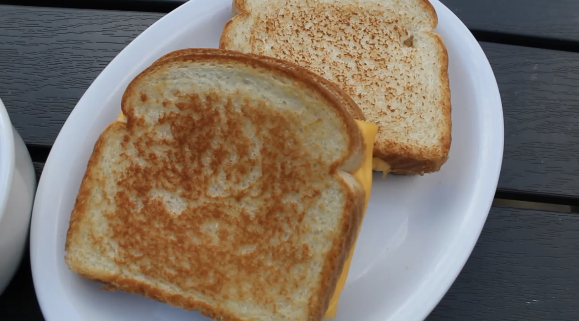 Grilled Cheese sandwich sitting on a plate.