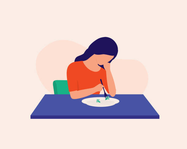 A cartoon depiction of a woman sitting at the table barely touching her food. She appears to be confused and hungry.